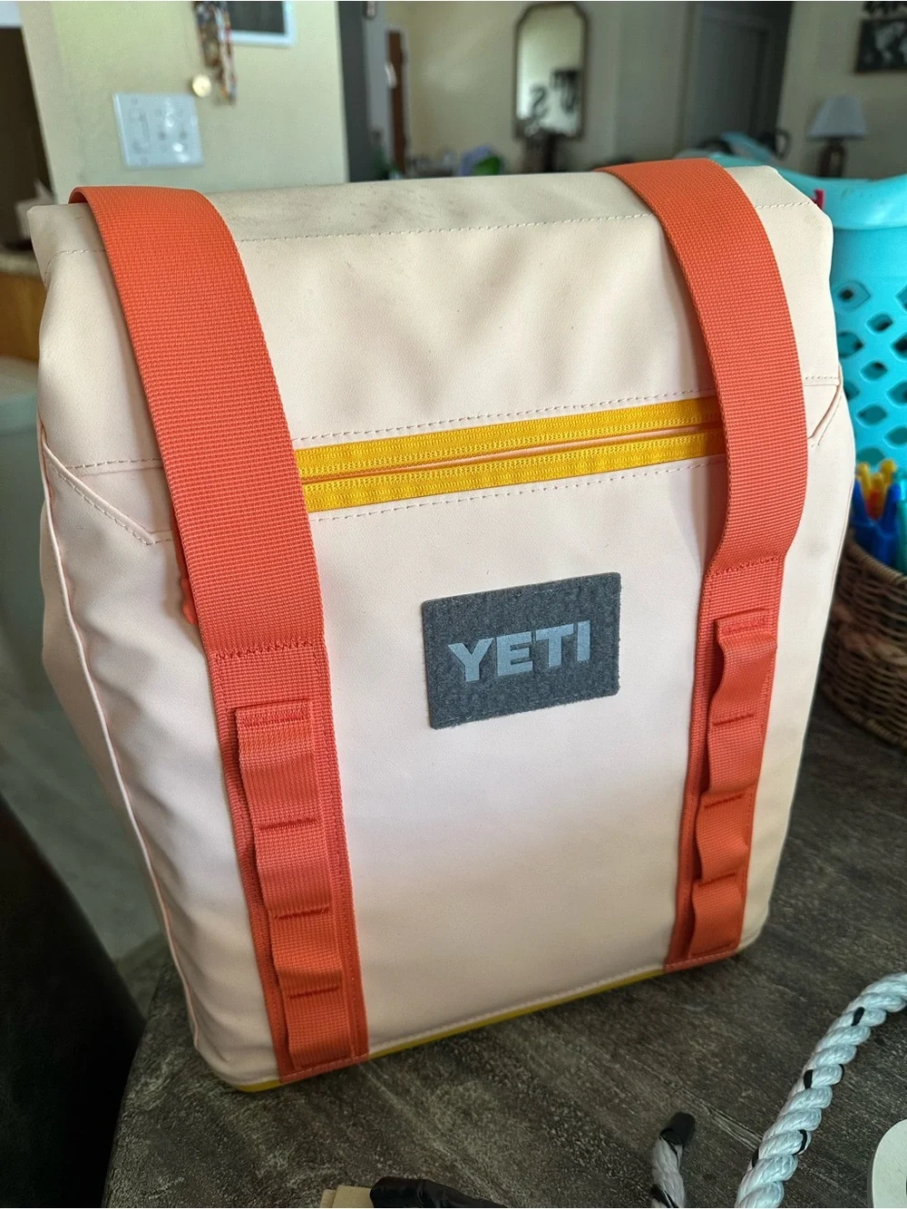 Yeti Pale Pink Backpack with Orange Straps and Yellow Zipper